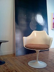 These classic mid-century furniture pieces blend well with Verburg's works These classic mid-century furniture pieces blend well with Verburg's works