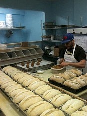 Owner Ted Pearson prepping for the bakery's day (photo: Planet Bakery) Owner Ted Pearson prepping for the bakery's day (photo: Planet Bakery)