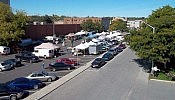 Despite being merely a parking lot, the Louis Street site gets a lot of seasonal use by the weekly Downtown Farmers' Market (photo: City of Peterborough) Despite being merely a parking lot, the Louis Street site gets a lot of seasonal use by the weekly Downtown Farmers' Market (photo: City of Peterborough)
