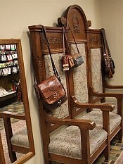 A wide selection of quality bags and accessories are displayed through the store A wide selection of quality bags and accessories are displayed through the store