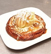 Rare's Apple Tart is freshly sliced apples caramelized in pancake/crepe batter, topped with French vanilla ice cream and caramel sauce (photo: Julie Gagne Photography) Rare's Apple Tart is freshly sliced apples caramelized in pancake/crepe batter, topped with French vanilla ice cream and caramel sauce (photo: Julie Gagne Photography)