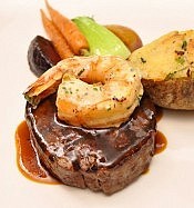 Rare's regular menu features entrées like this six-ounce grilled filet of Ontario beef, topped with a large grilled shrimp (photo: Julie Gagne Photography) Rare's regular menu features entrées like this six-ounce grilled filet of Ontario beef, topped with a large grilled shrimp (photo: Julie Gagne Photography)