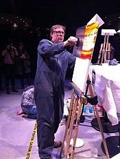 Paul Oldham puts on a rare display of showmanship at Art Battle #77 (photo: Liz Fennell)