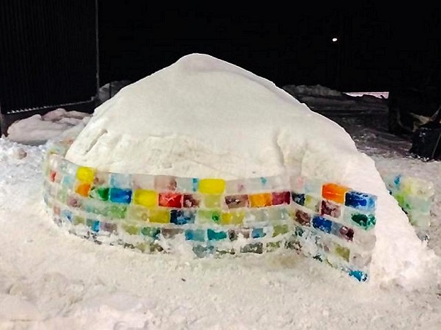 The first five rows of bricks are laid