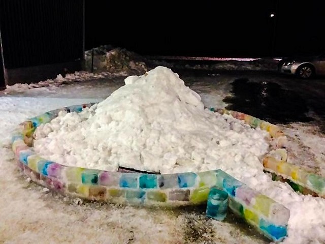 The first couple of rows of bricks are laid