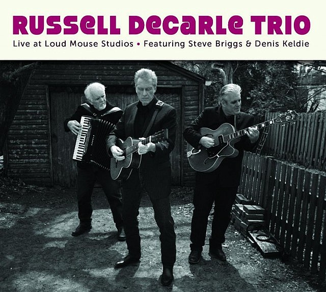 The 2014 album Russell deCarle Trio - Live at Loud Mouse Studios features 15 cover tunes by Russell deCarle, Steve Briggs, and Denis Keldie