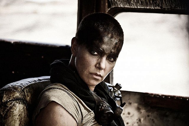 Charlize Theron as the Imperator Furiosa cuts an imposing and almost instantly iconic image that will rank with Sigourney Weaver