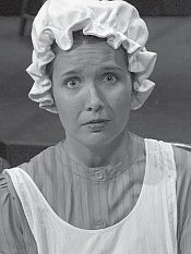 Jennifer Carr as Dolly, the terrified and addle-brained maid 