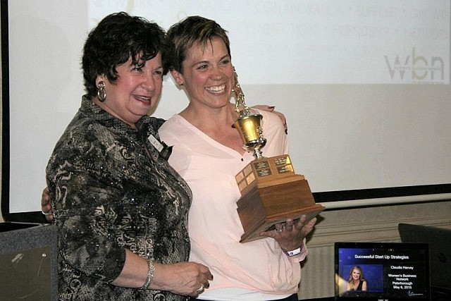Denise Travers of Sun Life Financial receiving the 2014-15 WBN Member of the Year Award from award founder Maureen Tavener (photo courtesy of WBN)