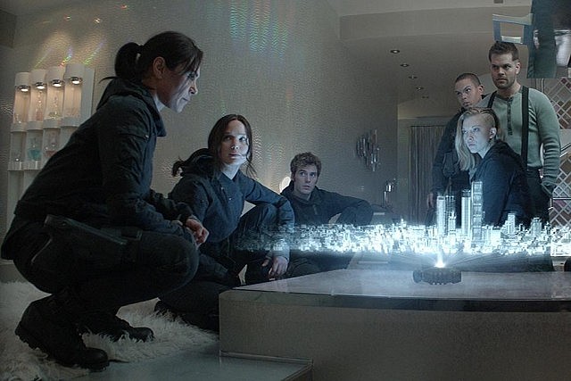 Michelle Forbes stars as Lieutenant Jackson, leading the squad of rebels into The Capitol