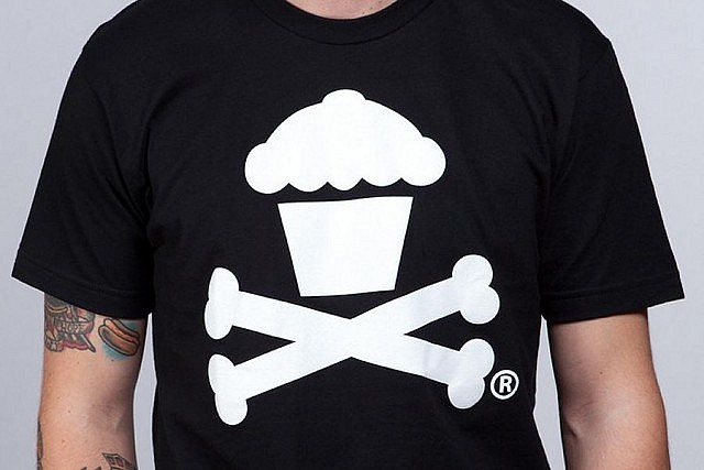 This cupcake-with-crossbones logo remains the design most identified with the Johnny Cupcakes brand