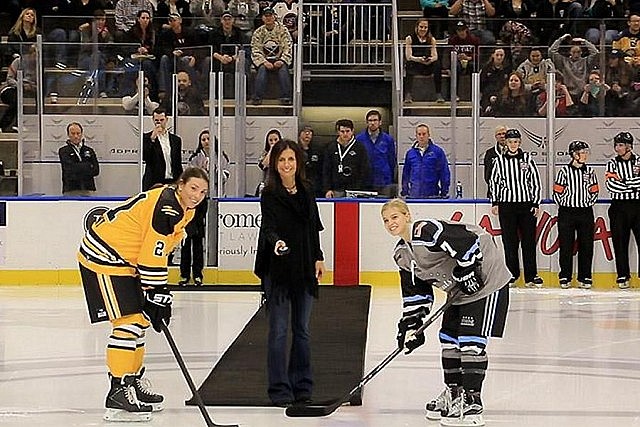 Manon Rhéaume dropping the puck at the ceremonial faceoff in October 2015 before the opening game for the National Women's Hockey League, the first-ever pro league for women