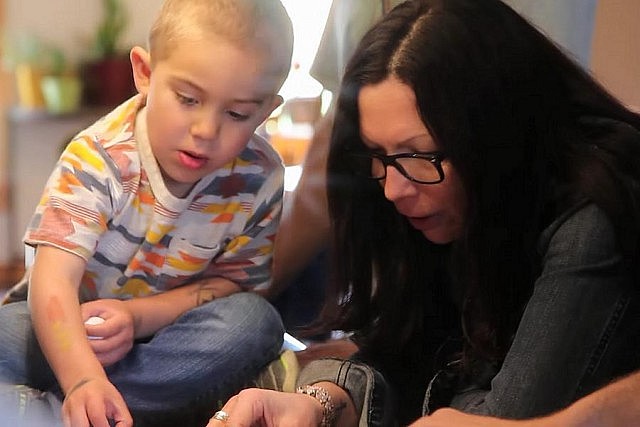 Now 52 and a grandmother to three, Michelle Thornton is currently cancer free and back to playing volleyball and baseball, jogging, and keeping a busy work schedule. (Photo: Jeremy Kelly)