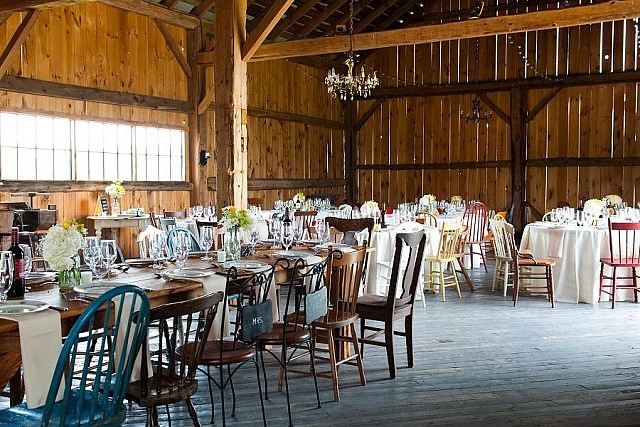 The dining space inside the century barn at South Pond Farms, a farm and event venue in Pontypool (photo: Blue Ant Media)